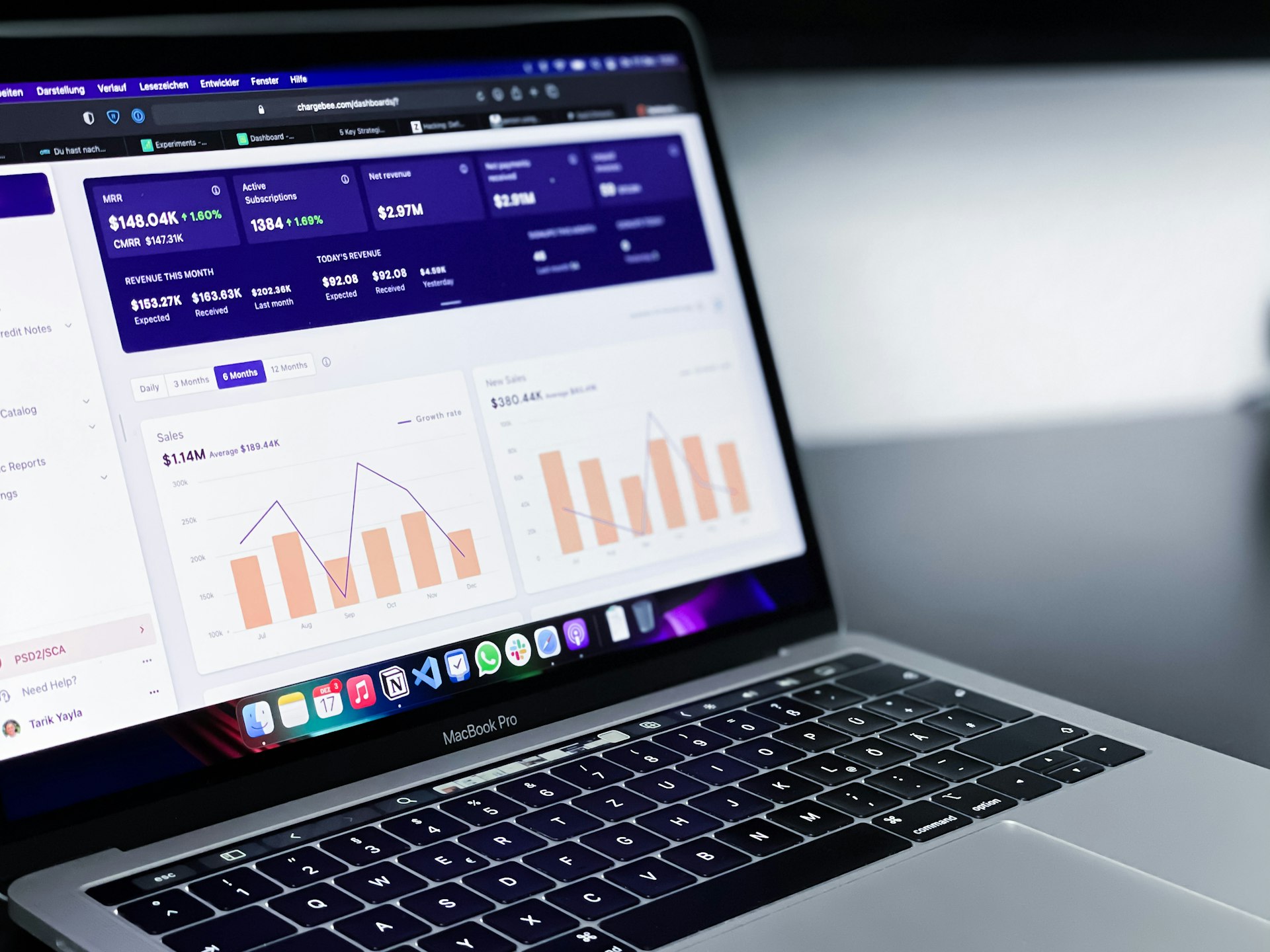 Black and silver laptop showing marketing analytics dashboard